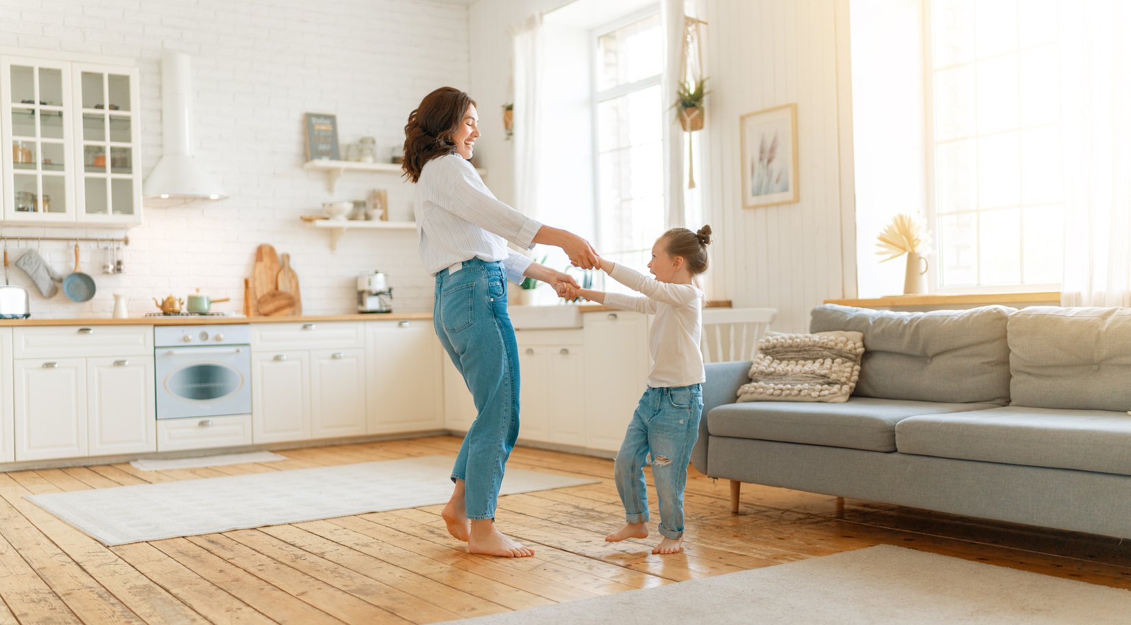 Mom and Her Daughter Are Dancing.